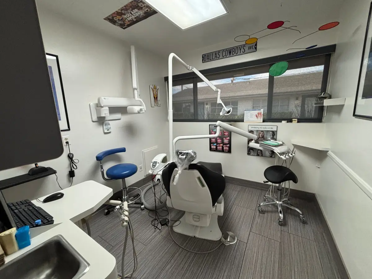 A treatment room at Ahn & Perez DDS, with the dental chair by a window